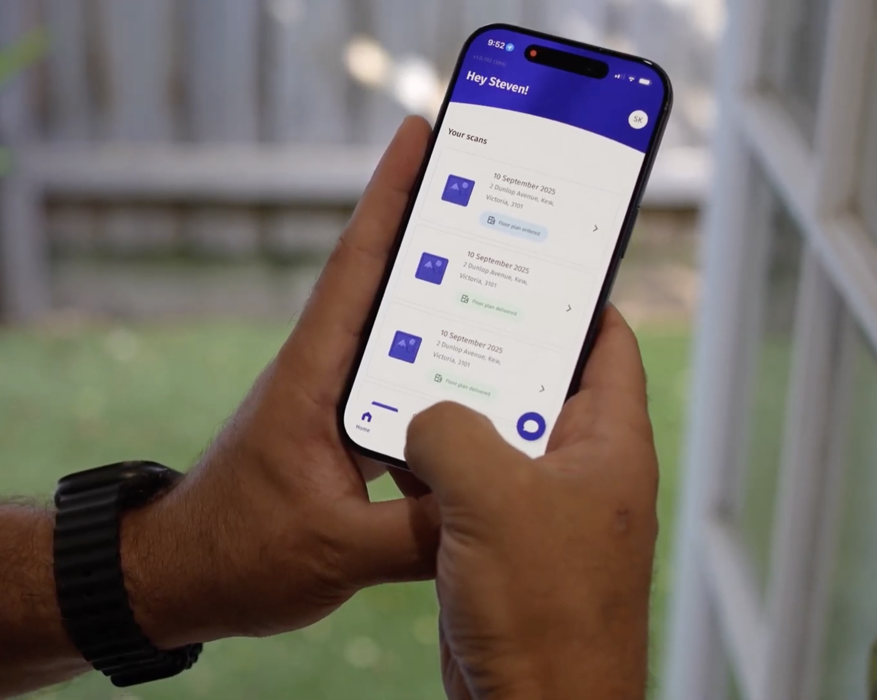 An agent reviewing his list of scans in the Roomio app, each one marked delivered
